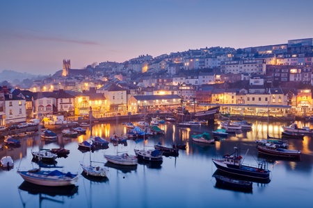 Overlooking Brixham harbour at dusk, Devon England UKのeditorial素材