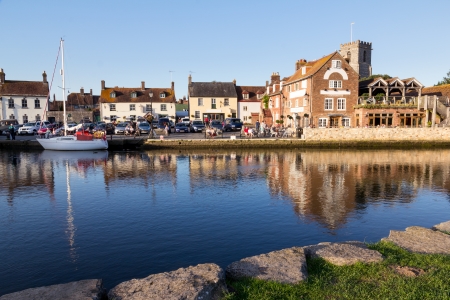 Wareham Quay Dorset England on the River Frome with the Old Granary and the Church of Lady St. Mary.のeditorial素材