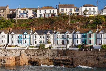 Row of seaside houses at Porthleven Cornwall England UK