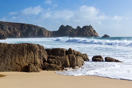 The beautiful golden sandy beach at Porthcurno Cornwall England UKの写真素材