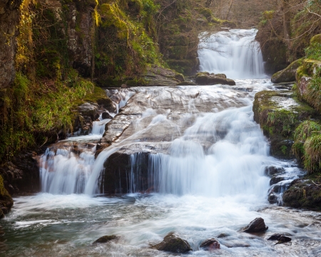 Watersmeet Falls, where the East Lyn River and Hoar Oak Water converge, Devon England UKの写真素材