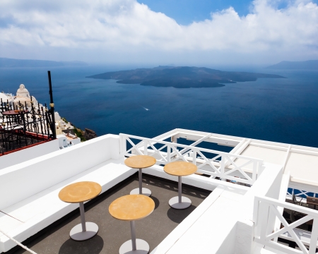 Seats on a roof in Fira Santorini Greeceの写真素材