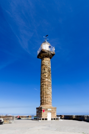 Lighthouse on Whitby West Pier Yorkshire England UK Europeの写真素材