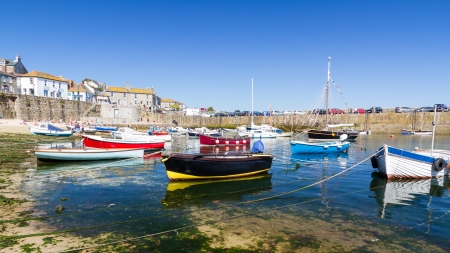 Summer at the historic fishing harbour Mousehole Cornwall England UK Europe