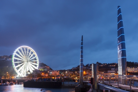 Millennium Bridge and Observation Wheel at dusk Torquay Devon England UK Europeのeditorial素材