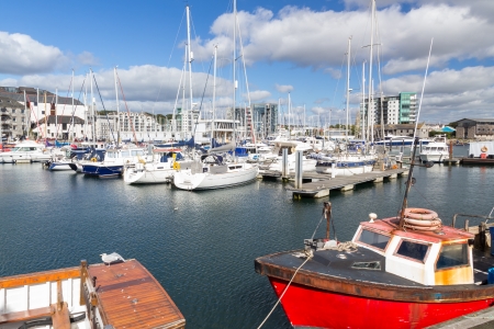 Boats in Sutton Harbour Plymouth Devon England UK Europeの写真素材