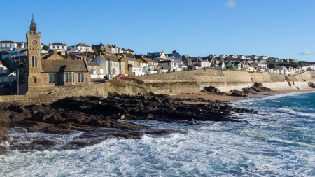 The seafront and Bickford-Smith Institute clock tower at Porthleven Cornwall England UK