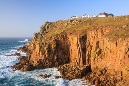 Towering granite cliffs at Lands End Cornwall England UK Europeの写真素材