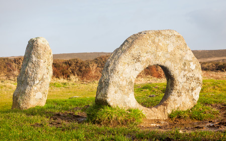 The Men-an-Tol is thought to date to either the late Neolithic or early Bronze Age. Located on Penwith Moor Cornwall England these standing stones are steeped in myth and legend.の写真素材