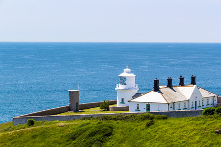 The 1881 Anvil Point Lighthouse on the coast of Dorset England UK Europe