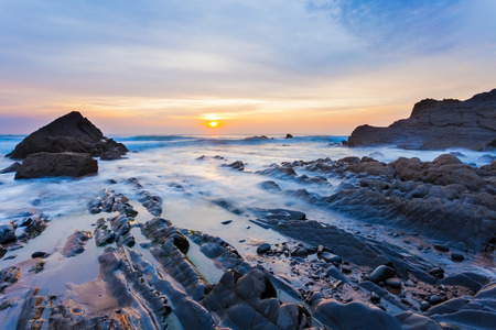 Stunning sunset on the beach at Sandymouth near Bude North Cornwall England UK Europeの写真素材