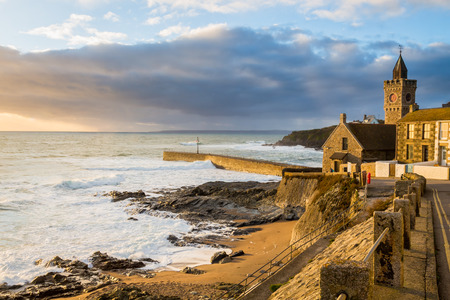 Overlooking Porthleven beach with the clock tower of the William Bickford-Smith Institute. Cornwall England UK Europeの写真素材