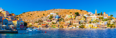 Panoramic shot of the beautiful Harbour at Symi Island in the Dodecanese Greece Europe.