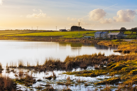 Dozmary Pool Lake on Bodmin Moor Cornwall England. It is one site that is claimed to be the home of the Lady of the Lake. According to the legend, this is the body of water into which Sir Bedivere threw Excalibur after King Arthur was mortally wounded.のeditorial素材