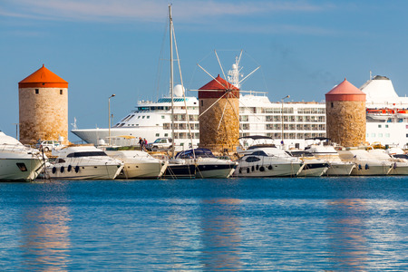 Windmills at Mandraki Harbour Rhodes Greece Europeのeditorial素材