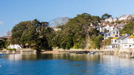 The coastal village of Flushing on the Penryn River, Part of the Carrick Roads Cornwall England UK Europeの写真素材