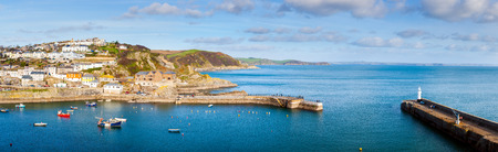 Panoramic shot overlooking the entrance to Mevagissey Harbour Cornwall England UK Europeの写真素材