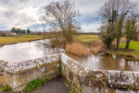 The River Frome and the historic  Wool Bridge Dorset England UK Europe