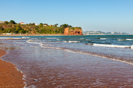 Goodrington Sands Beach and red cliffs near Paignton Torbay Devon England UK Europeの写真素材
