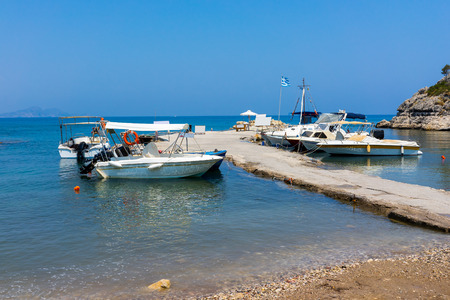Fishing boats moored at Kolymbia Rhodes Dodecanese Greece Europeの写真素材