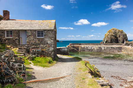 Historic harbour at Mullion Cove in Mounts Bay  Cornwall England UK Europeのeditorial素材