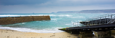 Winter time at Sennen Cove Cornwall England UK Europeの写真素材