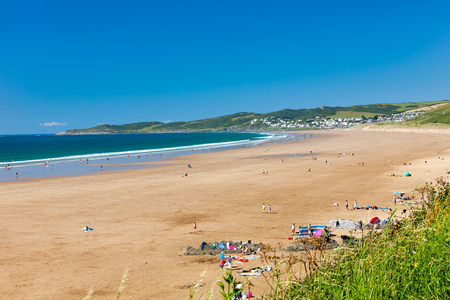 Overlooking the beautiful golden sandy beach at Putsborough Sands Devon England UK Europeのeditorial素材
