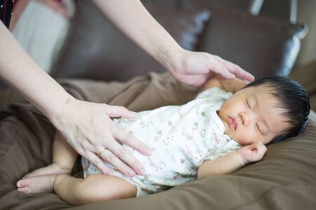 After infant eat breast milk from her mother and the she sleep on the pad bed