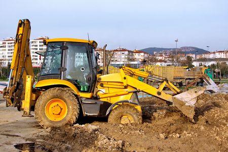 Construction Heavy Equipment - working in mud
