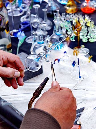 Craftsman working to create a glass whirling dervishの写真素材
