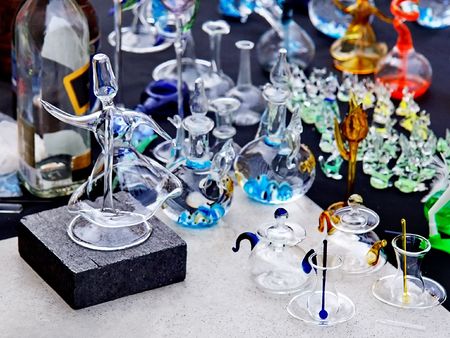 Glass ornaments on street market. Just finished dervish figure seen from above.の写真素材
