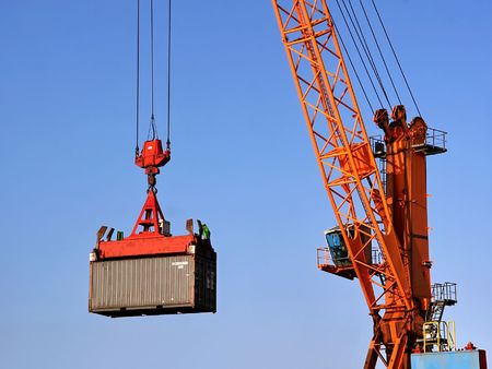 Container being lifted by a craneの写真素材