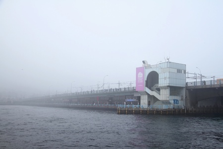 ISTANBUL - NOVEMBER 22: Heavy fog over Bosphorus shut down cross-city sea traffic early Monday morning.  Galata Bridge seen from aboveのeditorial素材
