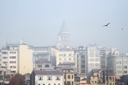 ISTANBUL - NOVEMBER 22: Heavy fog over Bosphorus shut down cross-city sea traffic early Monday morning.  Galata Tower seen from aboveのeditorial素材
