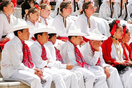 ISTANBUL - APRIL 23: Mexican children in white costumes wait their turn at National Sovereignty and...