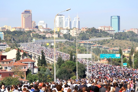 Istanbul, Turkey - October 17, 2010 : Thousands of people make their way through Bosporus suspended bridge during the 32nd Intercontinental Eurasia Marathon run.のeditorial素材