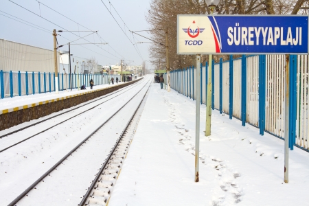 ISTANBUL - JANUARY 31: First snow of the season on January 31, 2012 in Istanbul. A giant snowstorm froze daily life as well as the streets all around the city of Istanbul. Sureyyaplaji Train Station in Winterのeditorial素材