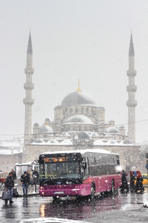 ISTANBUL - JANUARY 31: First snow of the season on January 31, 2012 in Istanbul. A giant snowstorm froze daily life as well as the streets all around the city of Istanbul. Eminonu Bus Stopのeditorial素材