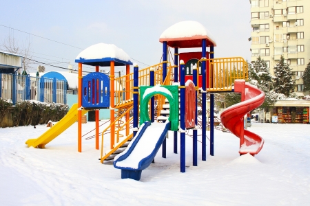 Colorful playground after winter snow のeditorial素材