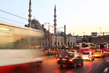 ISTANBUL - OCT 17  Evening traffic at Eminonu on October 17, 2012 in Istanbul, Turkey  Eminonu side is major travel and tourism centre in the city  Eminonu Square with Valide Sultan Mosque のeditorial素材