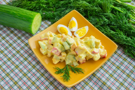 Light salad of cucumber, crab meat, corn and quail eggs with aioli sauce (all-i-oli)の写真素材