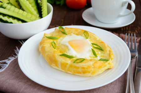 Khachapuri in Adjara (flat cakes with different fillings in the form of a boat) - the national dish of Georgian cuisine.の写真素材