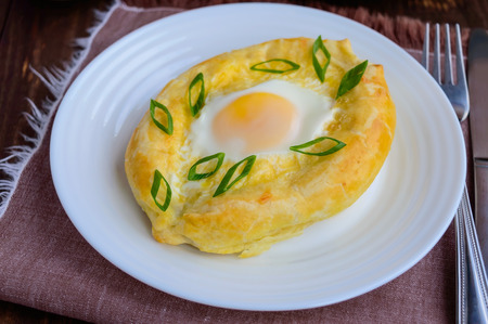 Khachapuri in Adjara (flat cakes with different fillings in the form of a boat) - the national dish of Georgian cuisine.の写真素材