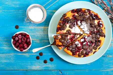 Cottage cheese pie with cherries and chocolate drops. The top view
