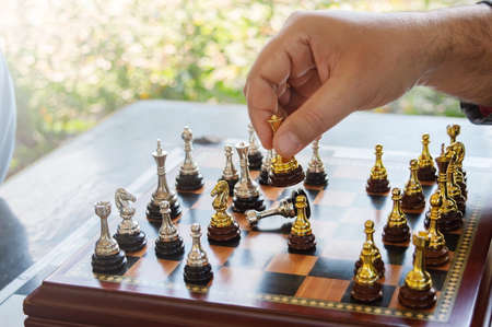 Concept for playing chess outdoor, end of the game, end of the match, business strategy. A man's...