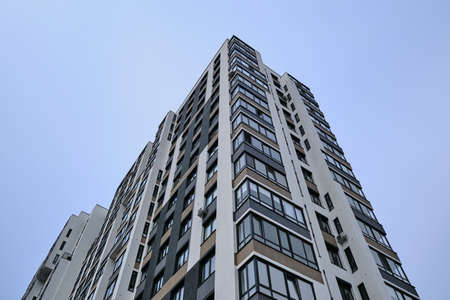 High-rise residential building against the sky. Elite area