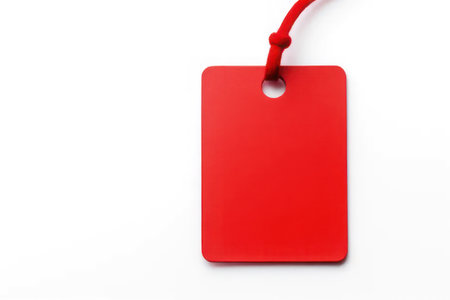 Mockup, tag. Red tag on a white background. AI generative. Illustration in photorealistic style.の素材