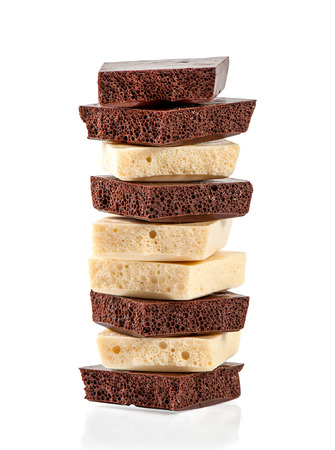 Black and white chocolate on a white backgroundの写真素材