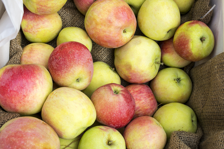 Fresh apples in a box close upの写真素材