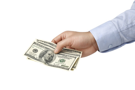hundred-dollar bill in his hands isolated on white backgroundの写真素材